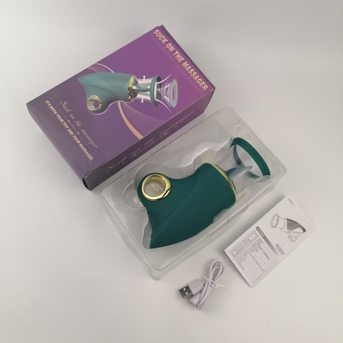 Complete packaging box and unboxed set of teal nipple sucking and licking massager, including magnetic USB charging cable and user manual.