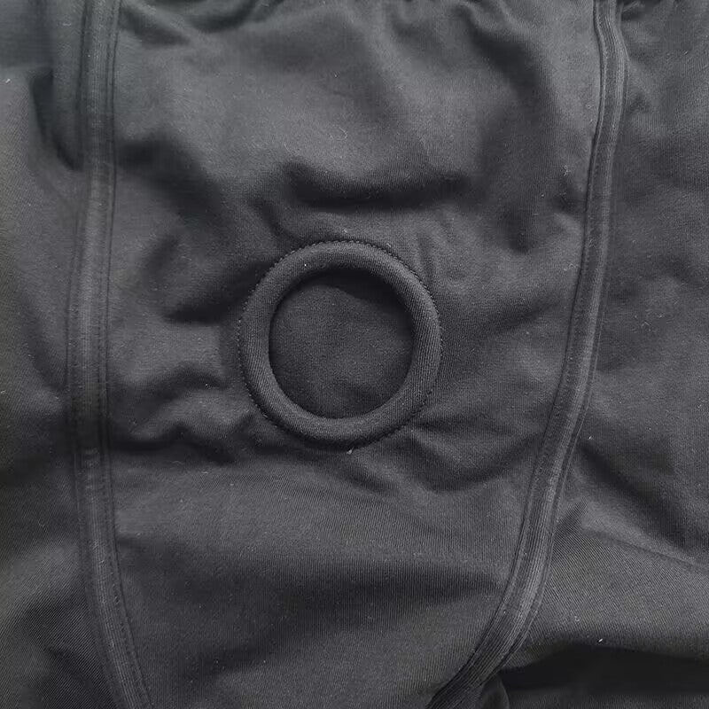 Close-up stitch detail of the durable 4.5cm elastic O-ring harness inside the trans packing underwear pouch.