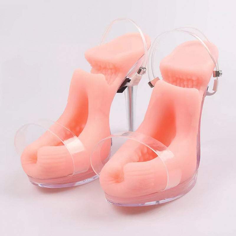 Pair of clear vibrating high heel male strokers with soft TPE texture on white background
