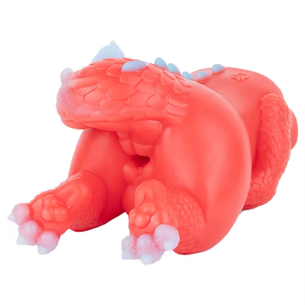 Rear view of the Crimson dragon silicone masturbator, highlighting the realistic scale texture on the tail and thighs.