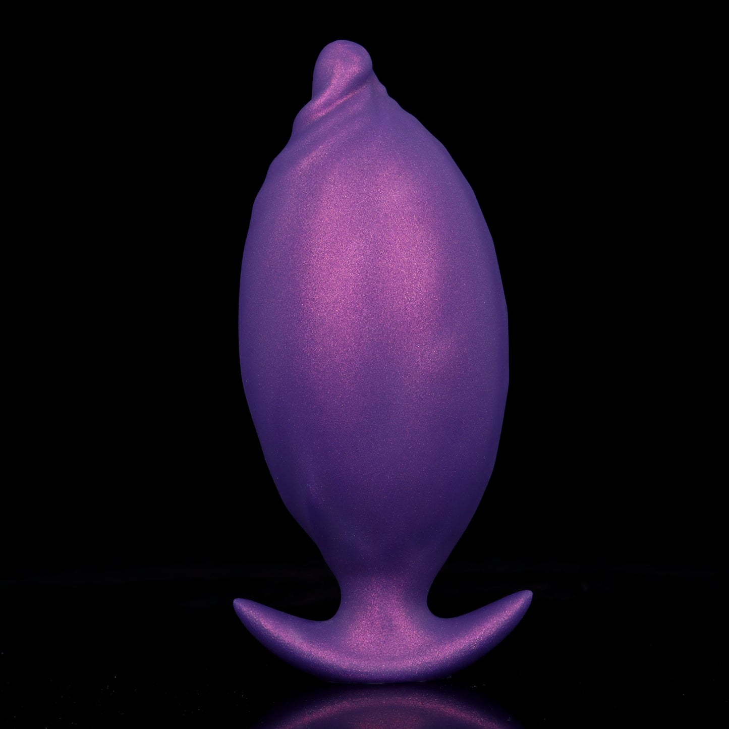 Fully inflated royal purple silicone butt plug showing the smooth outer balloon skin expansion with a wide flared anchor base.