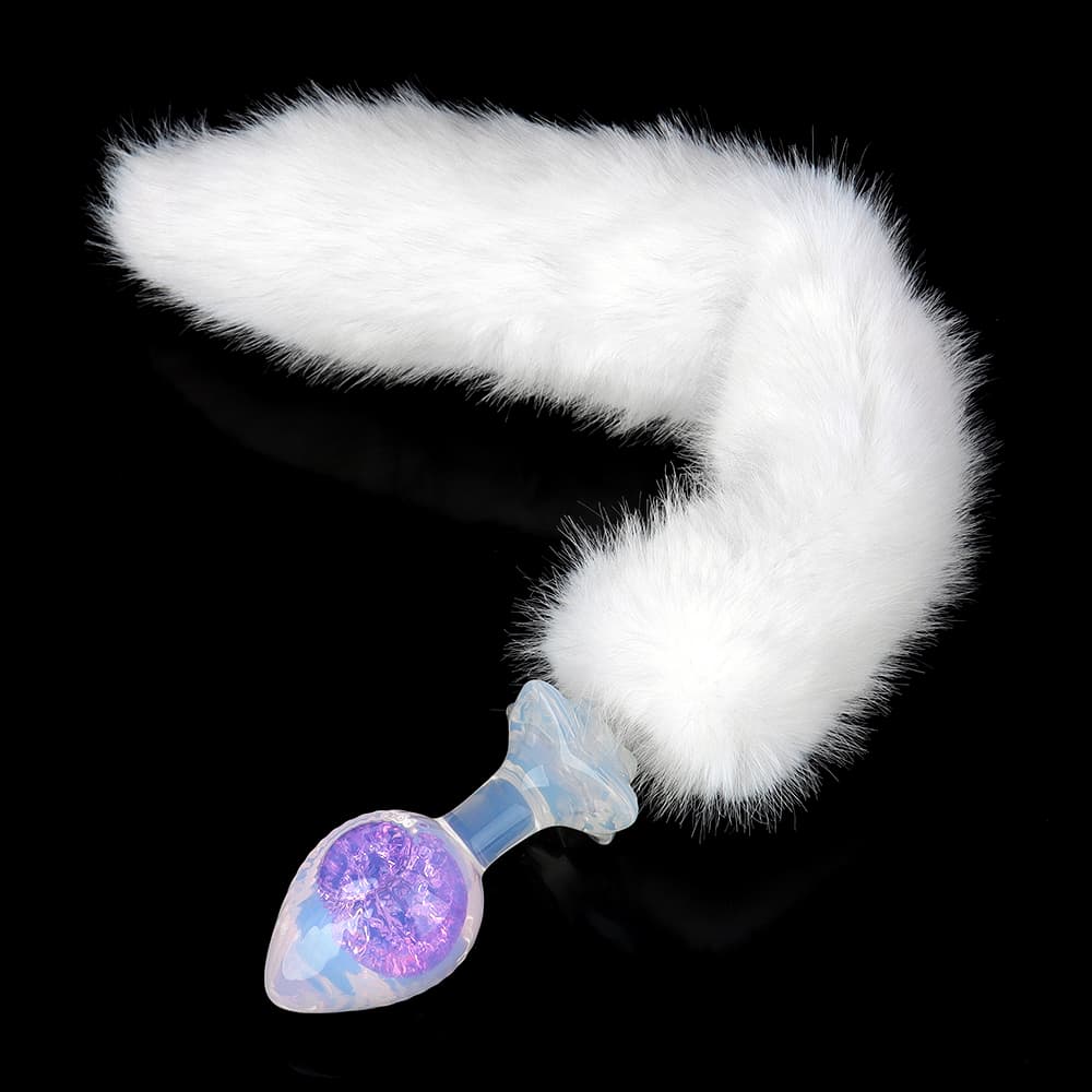 A romantic purple crystal core glass plug complete with a long, elegant white fluffy tail, perfect for playful cosplay and bedroom aesthetics.