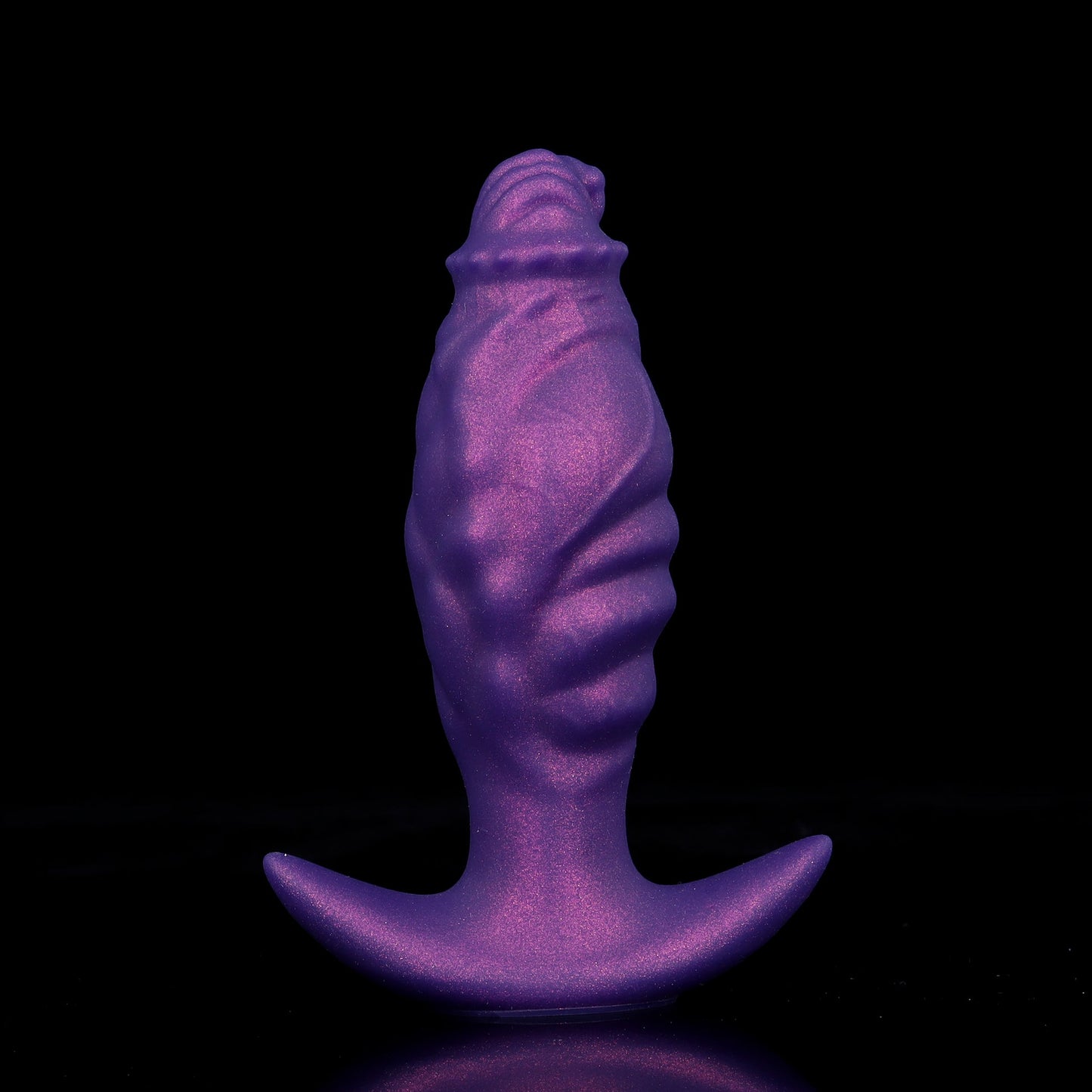 Front view of a deflated purple fantasy tentacle anal plug standing upright, showcasing deep cosmic ripple textures and a wide flared anchor base.