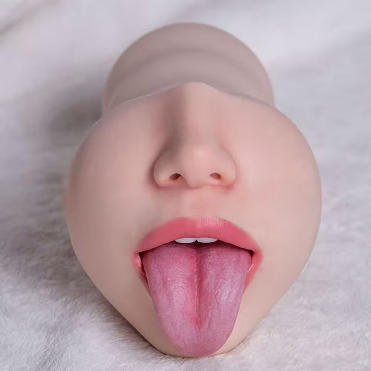 Close-up detail of realistic mouth and extended tongue designed for intense stimulation