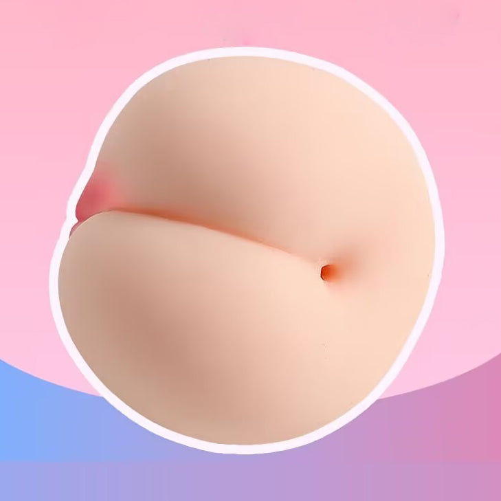 Realistic peach-shaped male stroker showing discrete soft entry orifice