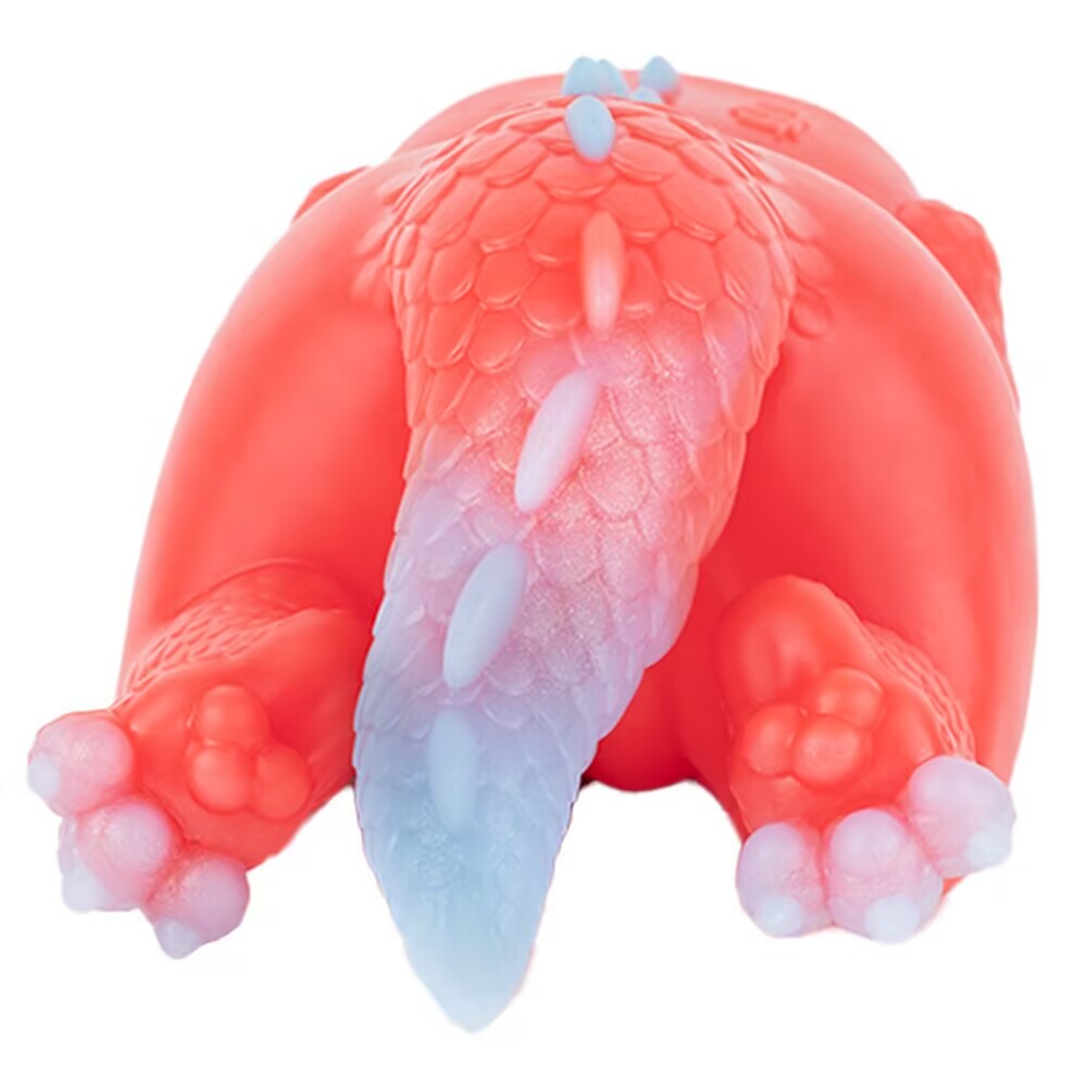 Detailed backview focusing on the translucent white and pink spine scales of the Crimson Magical Tiny Dragon toy.