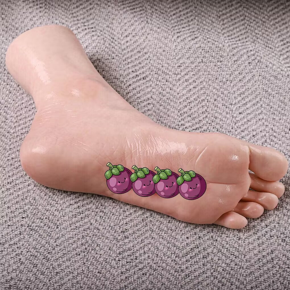 Side view of a silicone practice foot model showing detailed sole texture and smooth heel contour