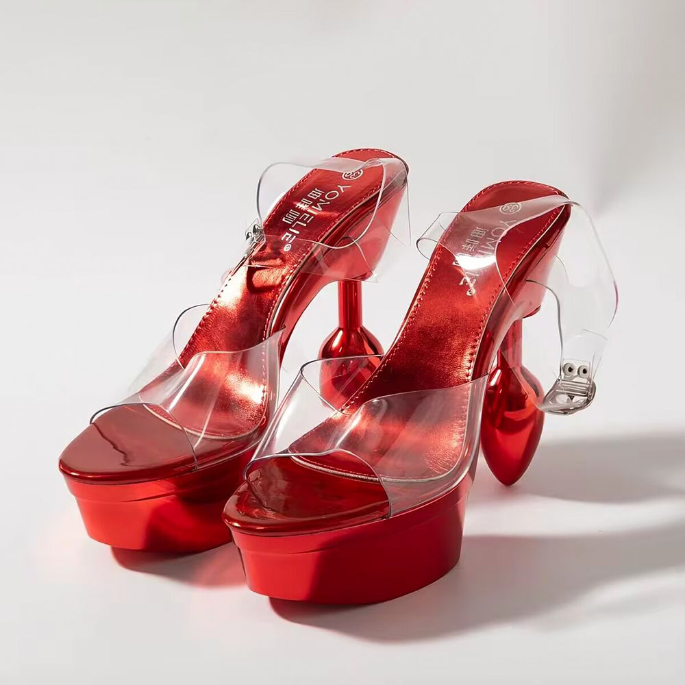 Side angle view of electric metallic red high platform sandals with clear transparent straps and shiny red footbed.