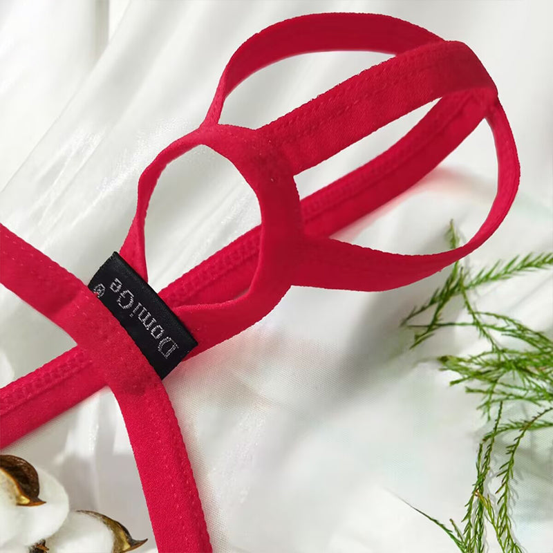 Close-up of the red men’s pouch thong briefs showing high-elastic stitching and double-ring ergonomic design.