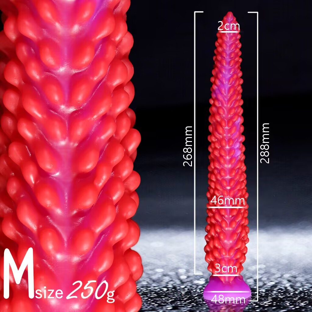 Red and purple medium size M fantasy spine dildo with suction base showing 288mm total height.