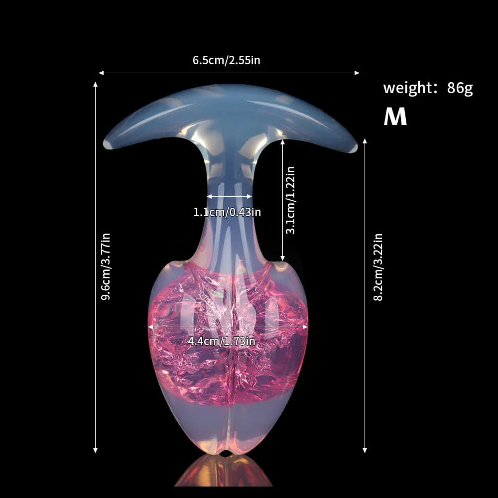 Medium size dimensions and weight specifications for the glowing rose pink crackle-interior plug.