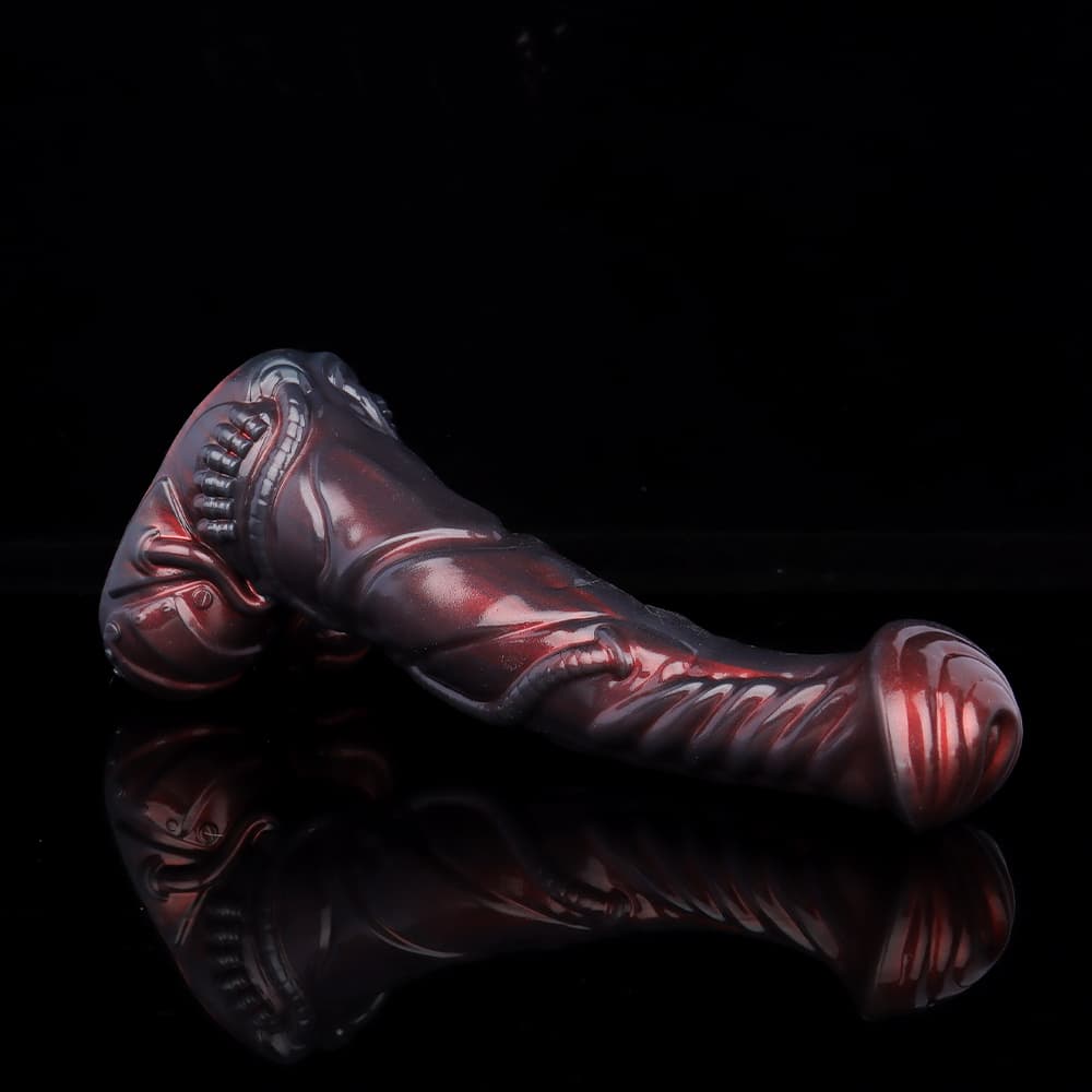 Side angle view showing the detailed biomechanical cable textures and glossy pearlescent finish of the sci-fi alien fantasy dildo.