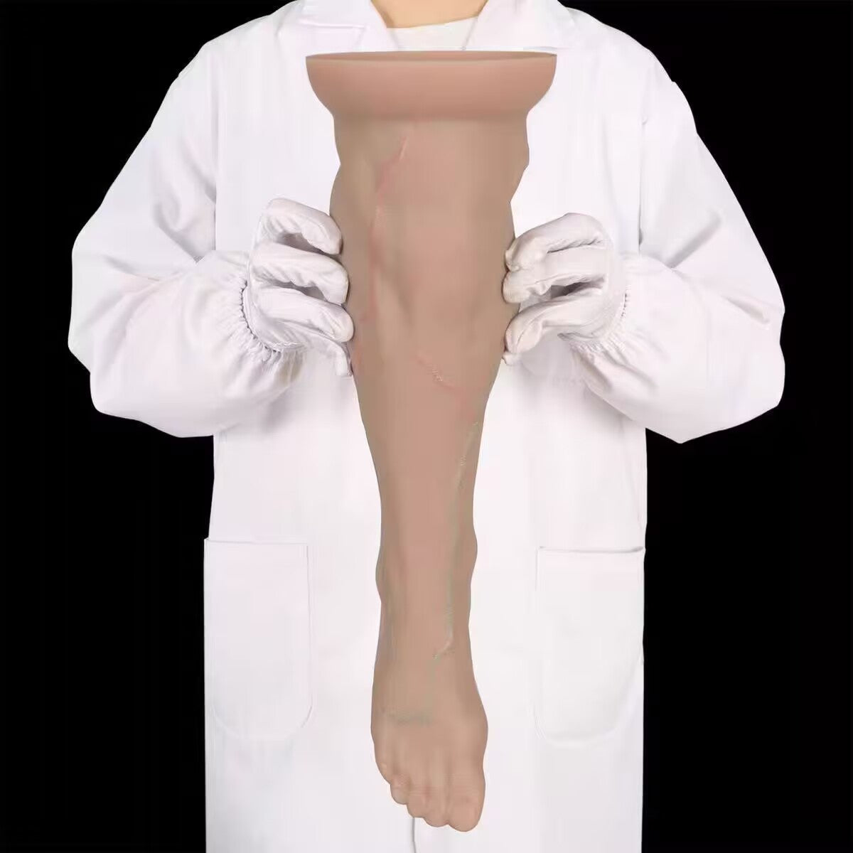 Upside-down view of a silicone foot anal dilator highlighting the wide sturdy suction base and smooth contours.