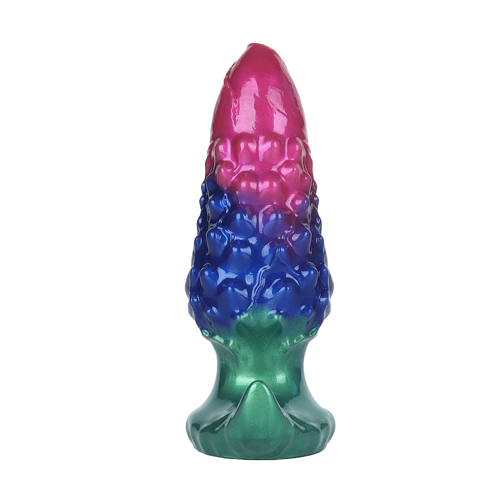Back view of a gradient-colored silicone monster anal toy with heavy biological textured bumps for sensory stimulation.