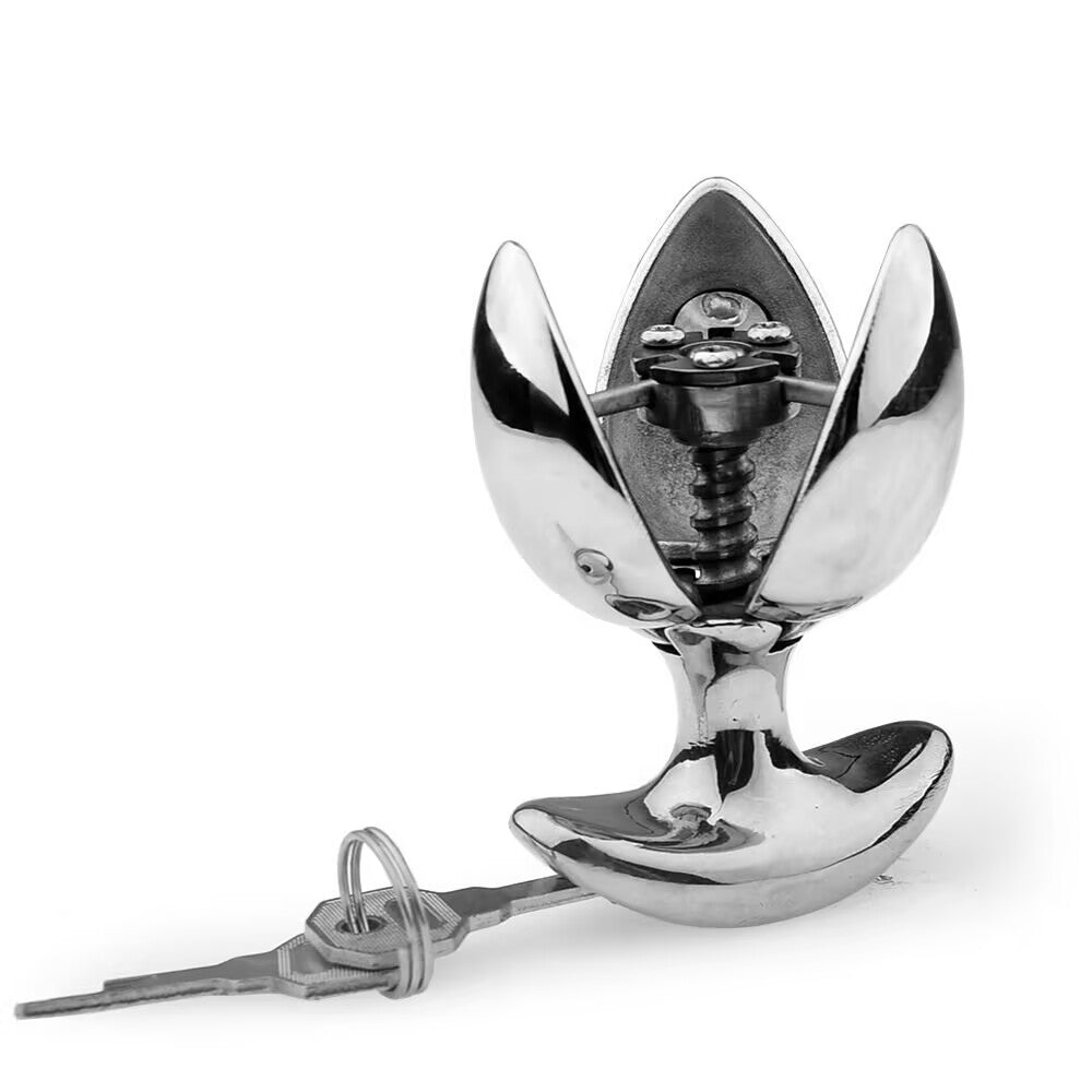 Front view of silver expanding metal blossom plug in fully open position with keys beside it.