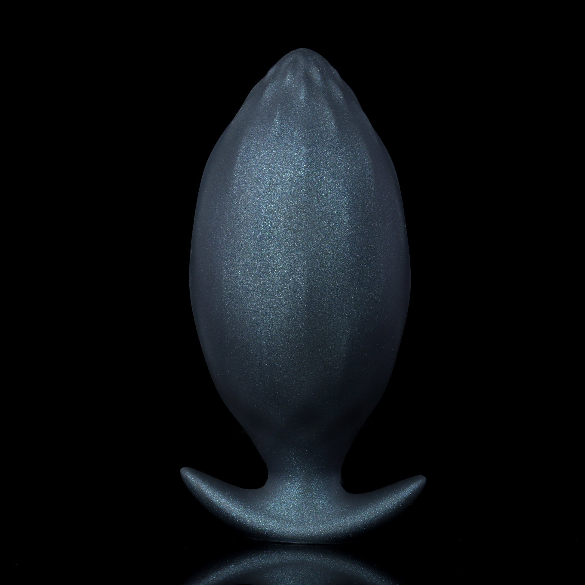 Rear view of the SirenBody black expandable butt plug showing the smooth, contoured geometric facets and wide anchor T-base.