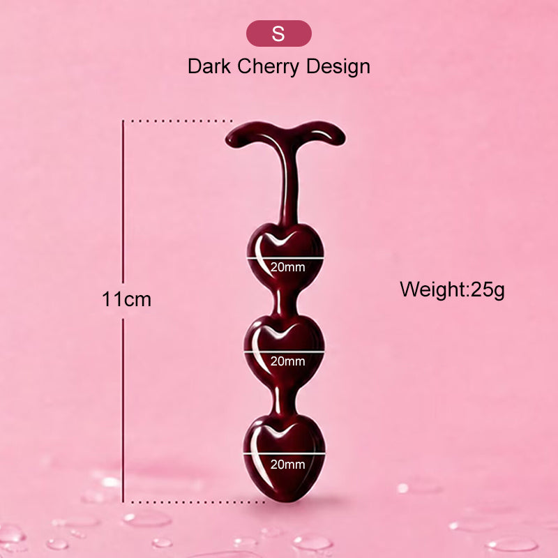 Small dark cherry design anal beads plug measuring 11cm in length with 20mm beads.
