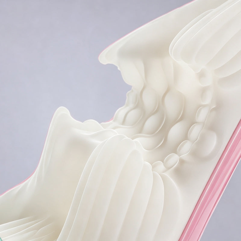 Detailed close-up of flexible white soft silicone inner chamber featuring ribbed and textured tactile waves