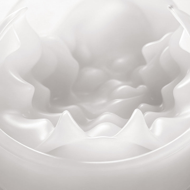 Macro close-up of soft white TPE front entry portal with ribbed tight sleeve for sensory stimulation