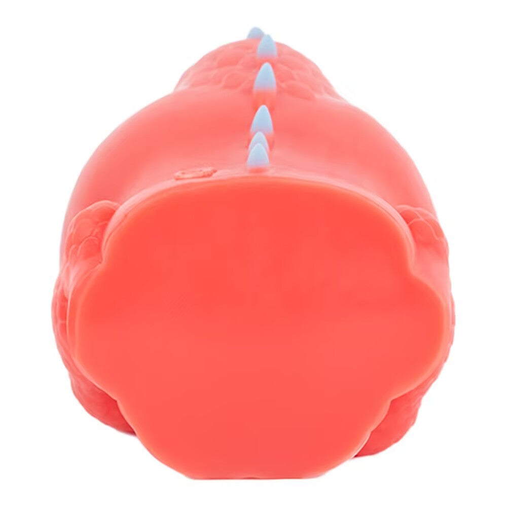 Flat solid silicone bottom base of the dragon toy, showing the high-density material structure.