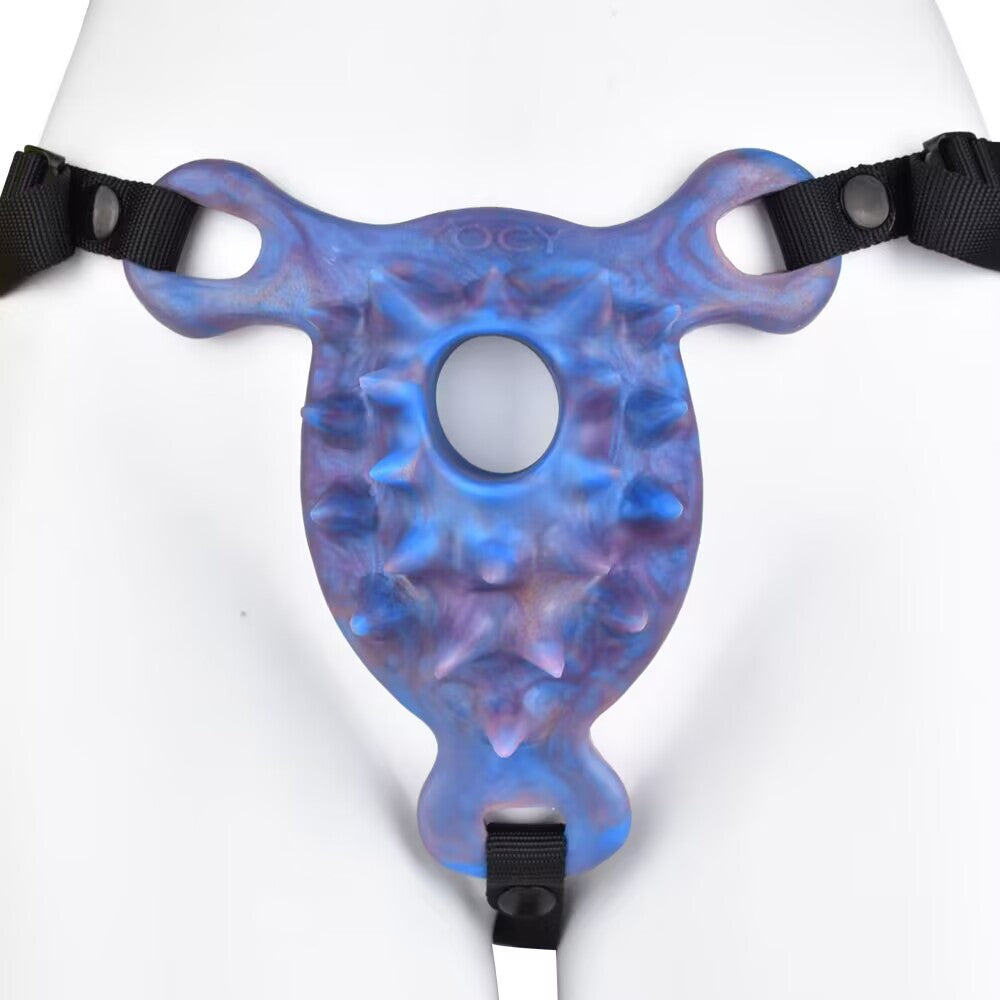 Front view of spiked contour wearable grinder pad attached to body mannequin