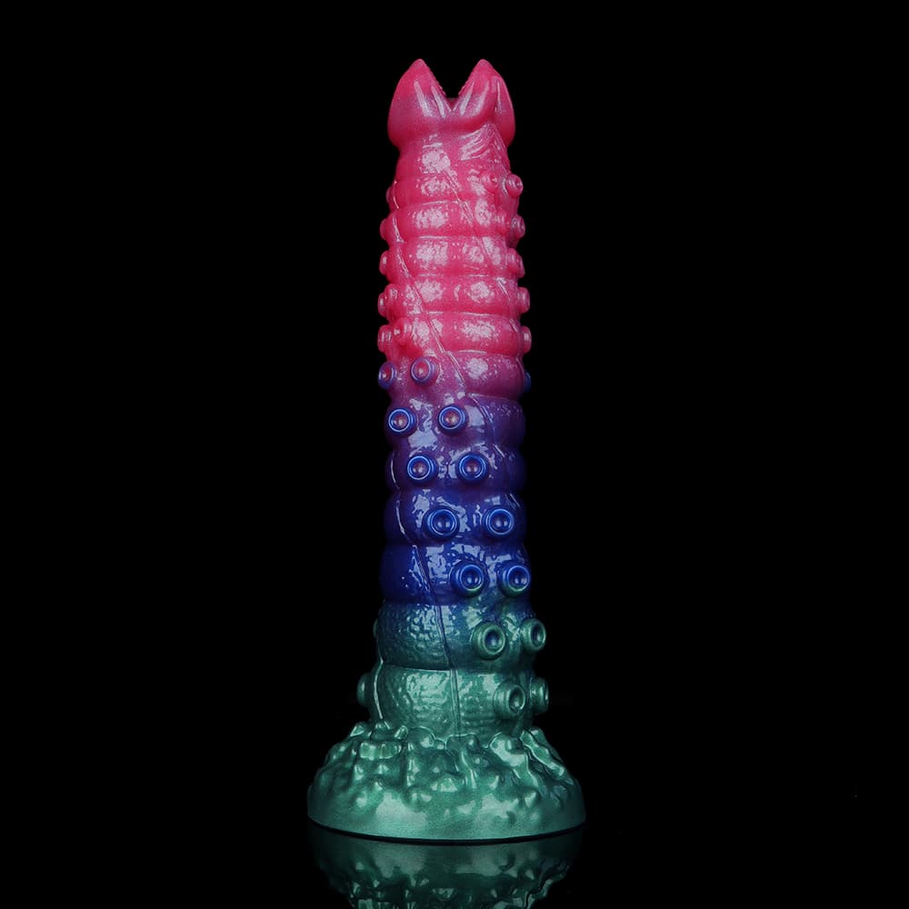 Full-length view of the textured silicone alien dildo standing upright, highlighting the biomechanical ridges and tentacle-like suckers for intense internal stimulation.