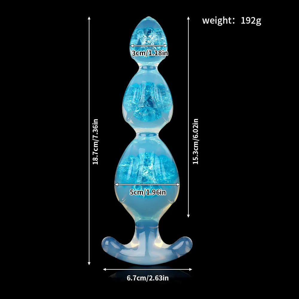 Size chart of transparent ice blue silicone butt plug with graduated 3-bead design details.