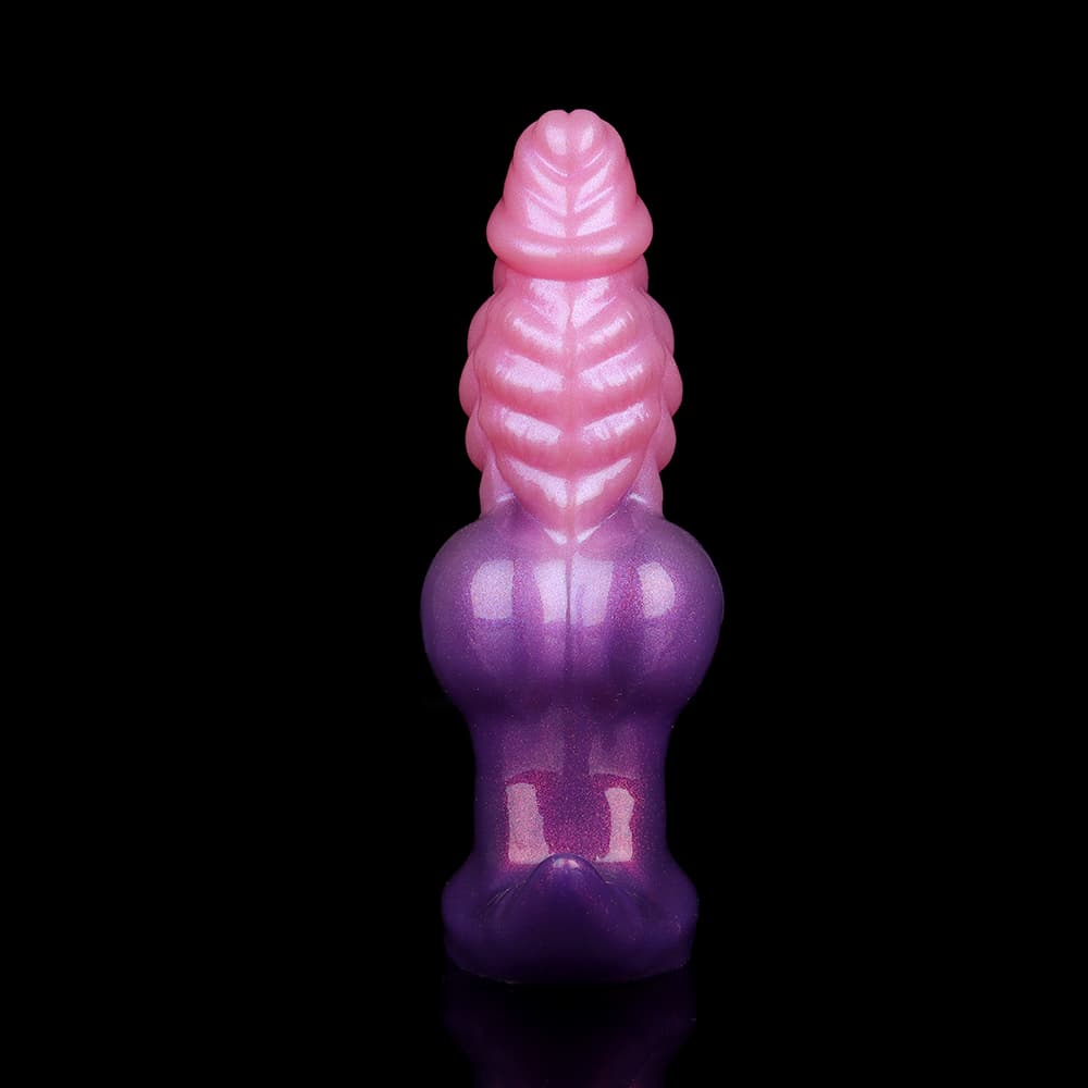Rear view of the uninflated creature tail sex toy, showing symmetry of the ribbed pink top and the purple dual-sphere midsection.