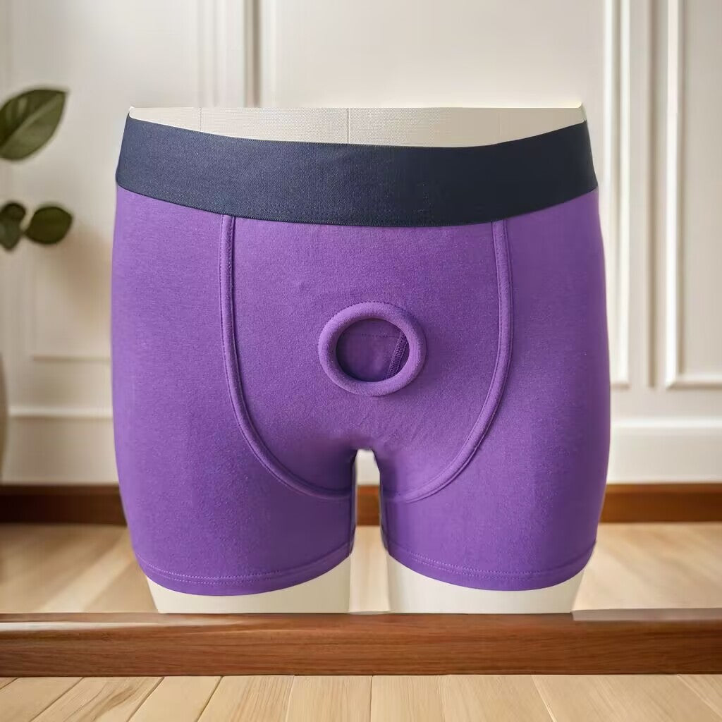 Vibrant purple gender-affirming packing underwear with dark navy waistband for trans and nonbinary individuals.