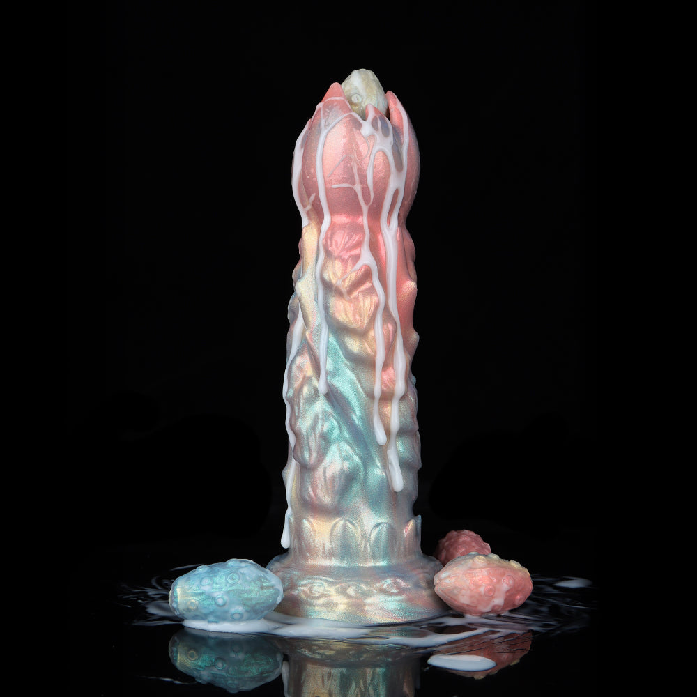Vertical shot of the iridescent alien monster dildo covered in dripping milky white fluid lubricant, simulating an oviposition and messy fantasy play scene with silicone eggs at the base.
